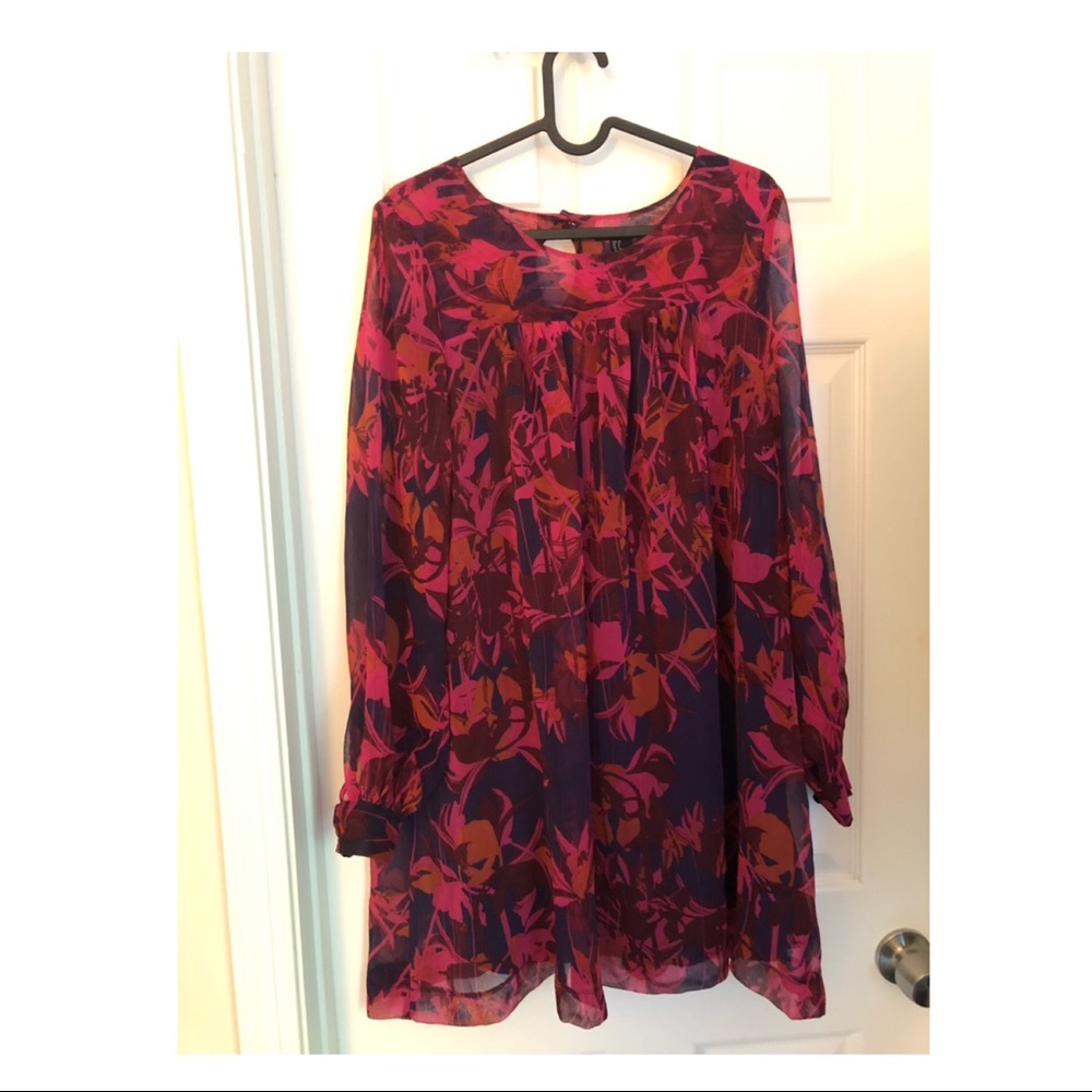 Pink and purple flared dress .